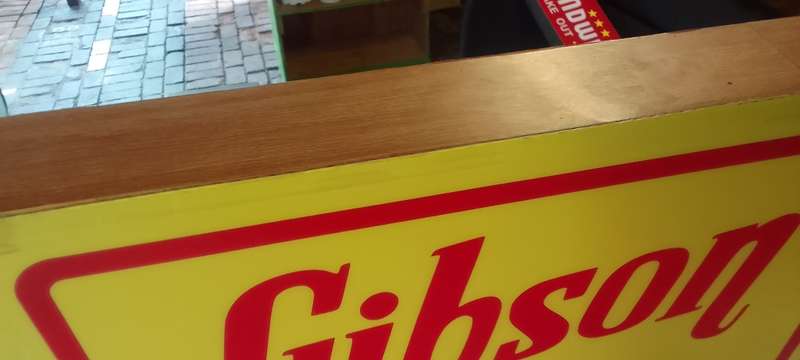 gibson guitars advertising sign
